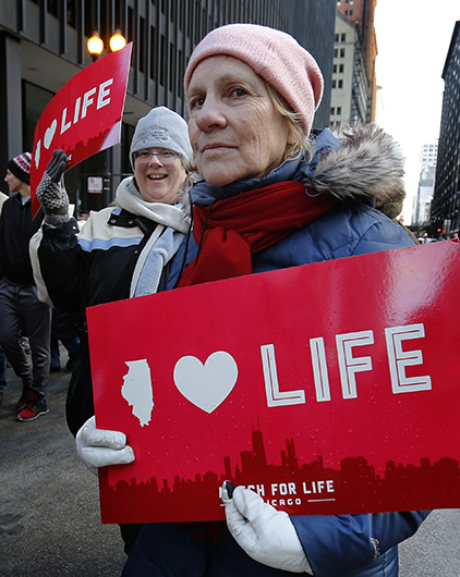 Illinois March for Life participants proclaim “women deserve