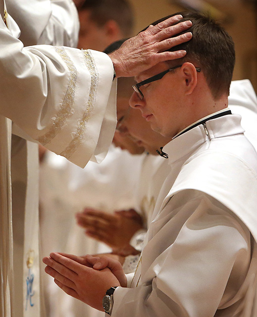 Meet the Catholic priests who minister to Chicago baseball teams