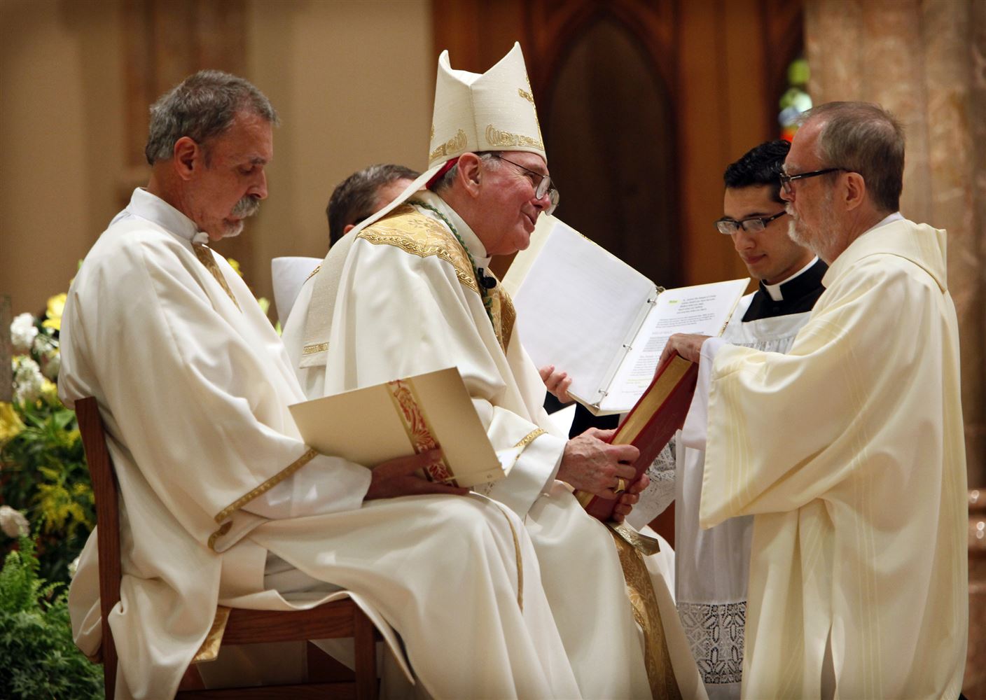 15 men join ranks as permanent deacons to serve in archdiocese