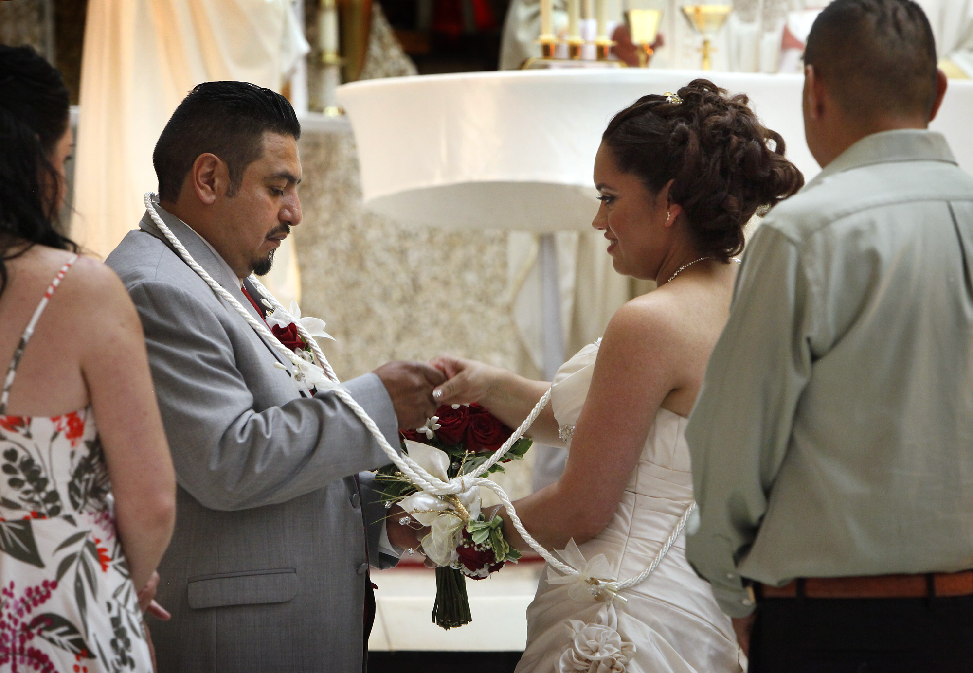Nine couples receive blessings at 'community wedding ...