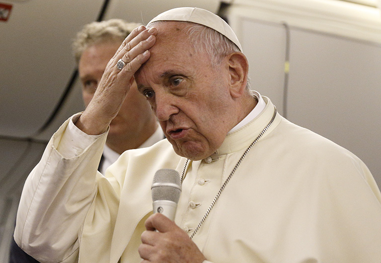 Image result for pope francis blessing with holy water